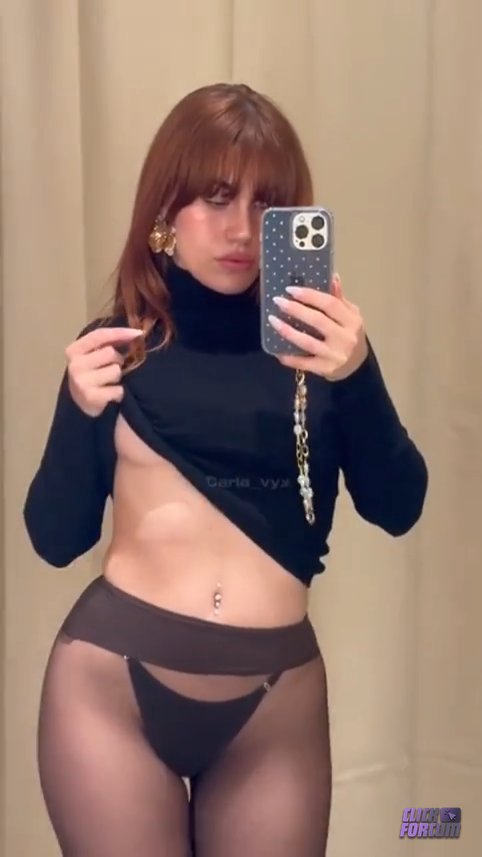 Carla Vyx   I do a striptease and finger myself in a fitting roo